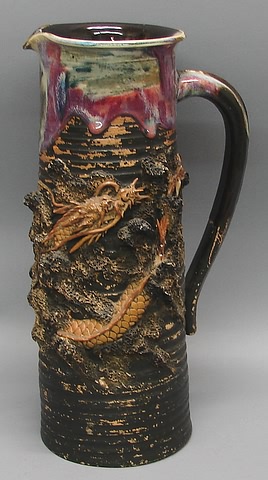 Appraisal: Sumida tankard with dragon motif x including handle Minor loses