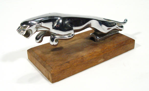 Appraisal: Chrome Jaguar car mascot on a wooden base cm long