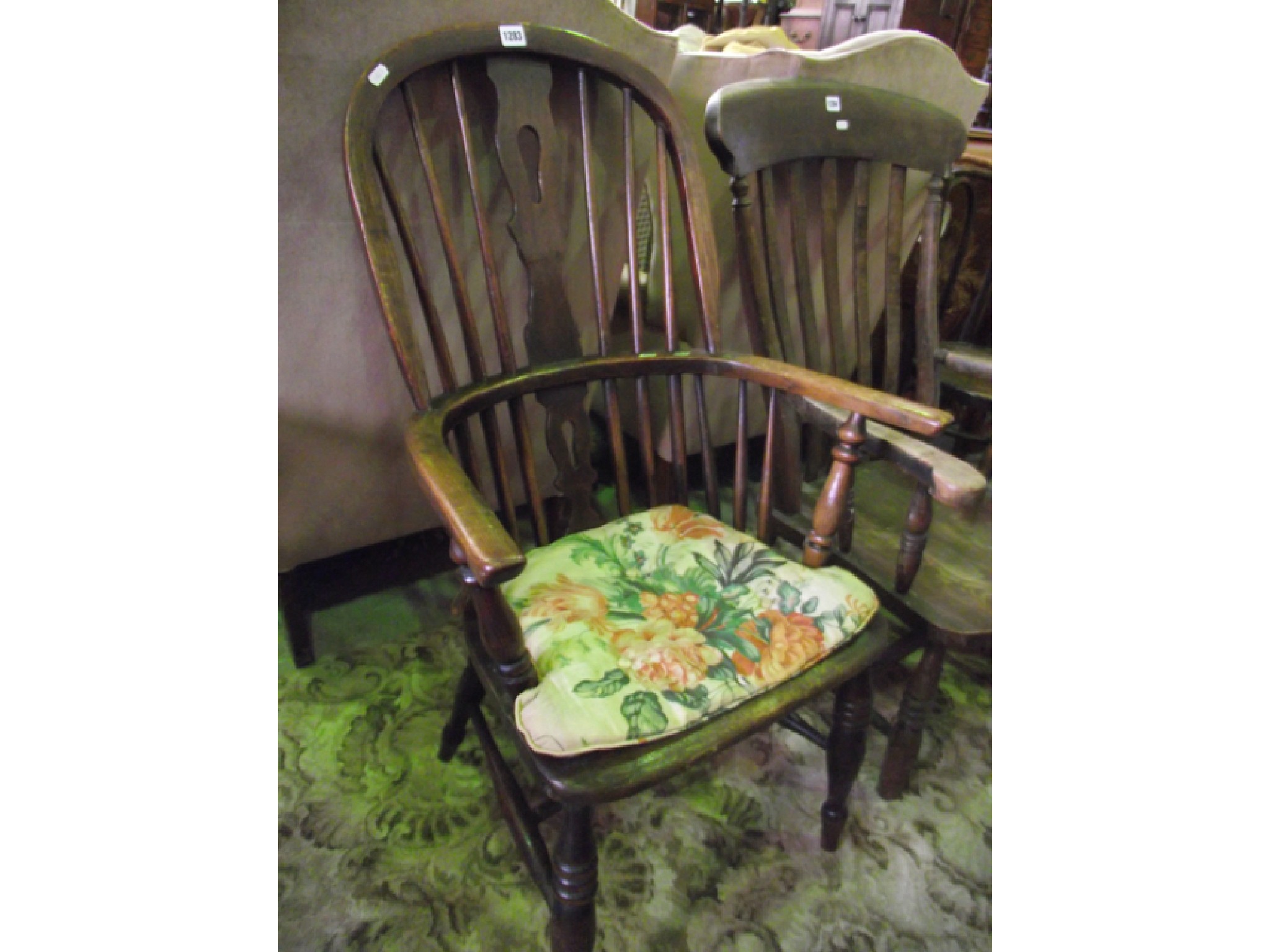 Appraisal: An early th century Windsor comb back elbow chair principally