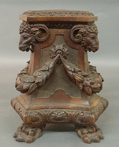 Appraisal: - Continental walnut pedestal c with carved ram s heads