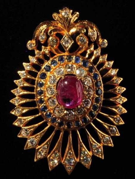 Appraisal: K Y Gold Brooch Description With cabochon cut ruby carats