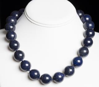 Appraisal: Lapis Necklace Twenty-two mm lapis beads each individually knotted K