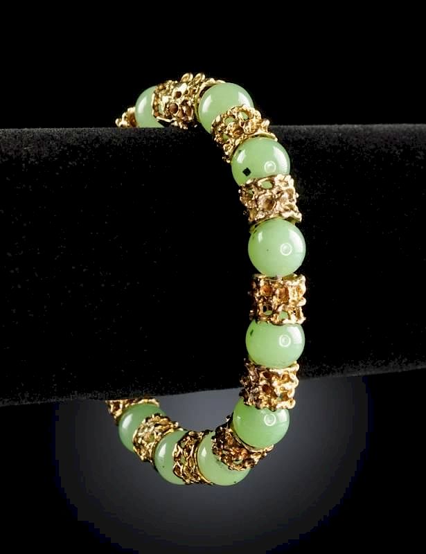 Appraisal: A K YELLOW GOLD AND GREEN JADE LADY'S BRACELET A