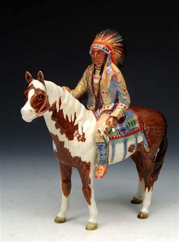 Appraisal: A BESWICK MODEL of a Red Indian on horseback with