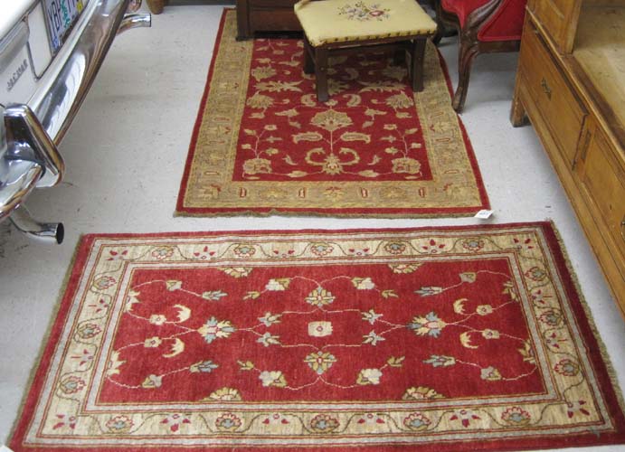 Appraisal: TWO SIMILAR HAND KNOTTED ORIENTAL AREA RUGS Pakistani-Persian overall floral