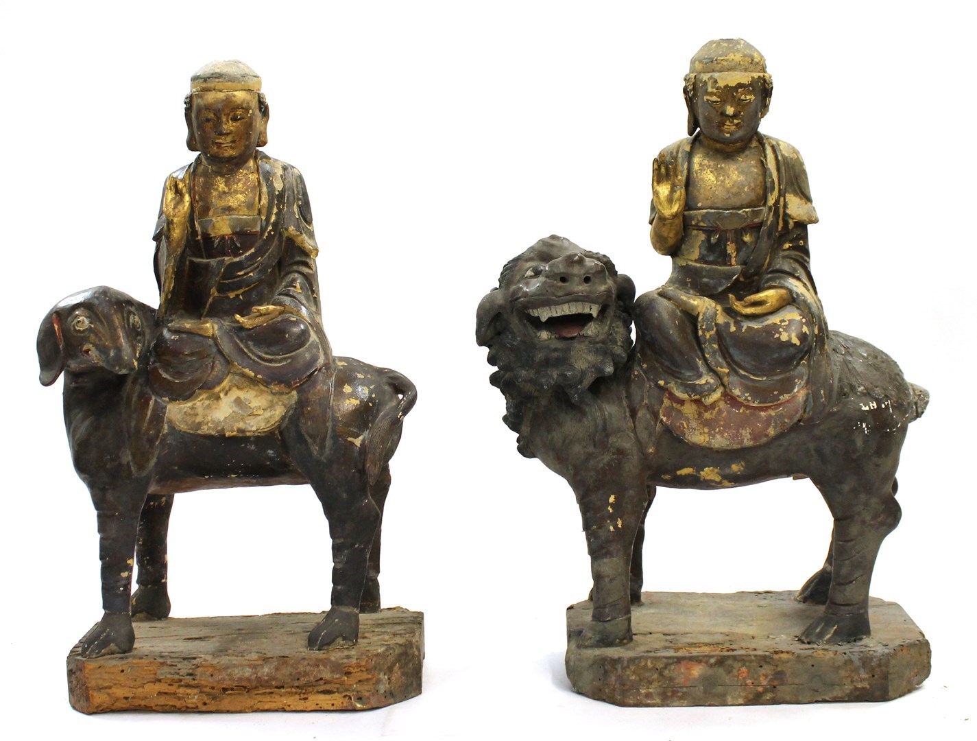 Appraisal: A pair of th century Chinese giltwood and lacquered groups