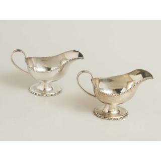 Appraisal: Two Sterling Sauce Boats Two sterling sauce boats Barker Brothers