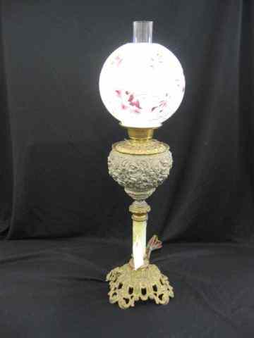 Appraisal: Victorian Banquet Lamp floral globe fancy cherub metal work base