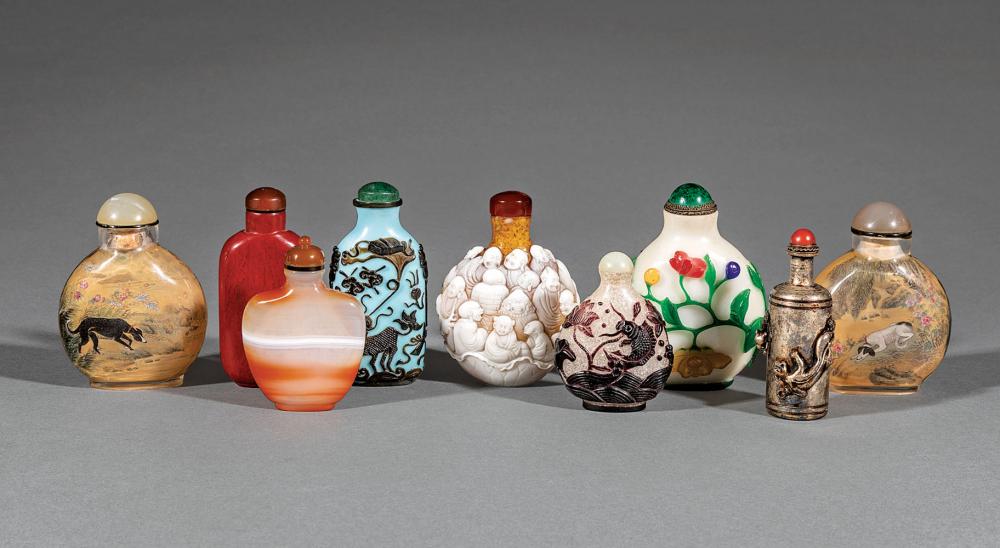 Appraisal: Nine Chinese Snuff Bottles th c incl white overlay goldstone