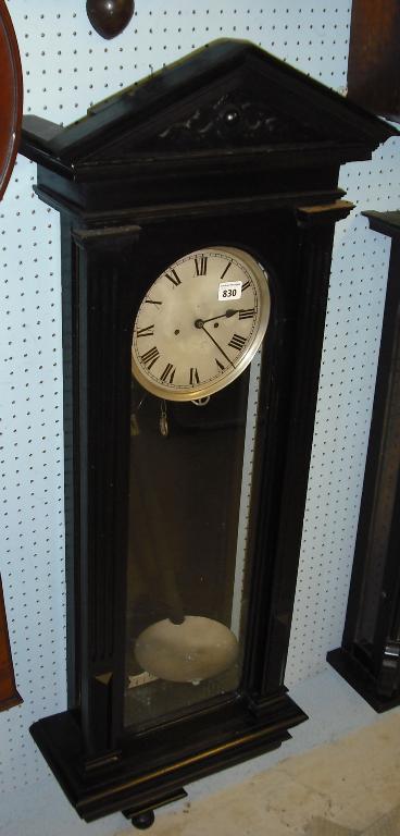 Appraisal: Ebonised double weight Vienna regulator the silvered dial within a