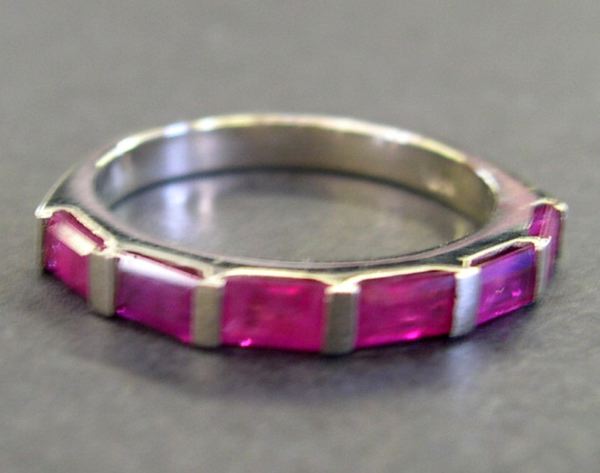 Appraisal: Fourteen-Karat White Gold and Ruby Band containing six baguette rubies