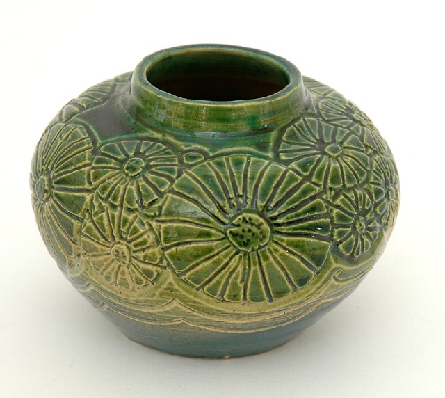 Appraisal: MARGUERITE MAHOOD Victoria circa Compressed globular earthenware vase green glaze