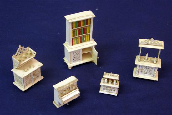 Appraisal: A Victorian carved bone dolls house bookcase high a similar