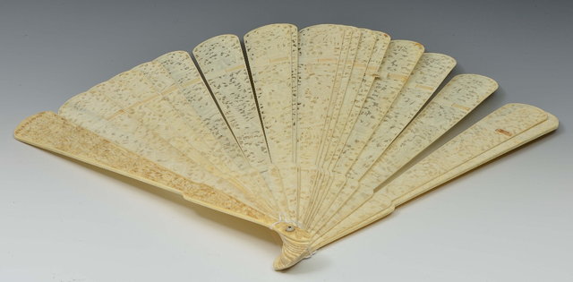 Appraisal: A CHINESE CANTON IVORY FAN finely carved with figures within