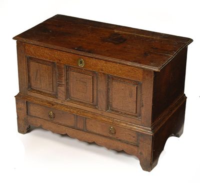 Appraisal: A Welsh small oak chest moulded edge top and fielded