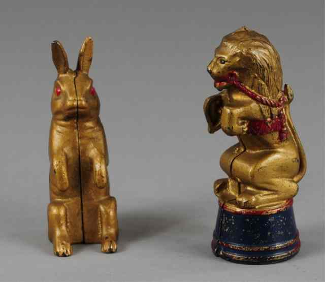 Appraisal: LION AND RABBIT STILL BANKS Cast iron includes Begging Rabbit