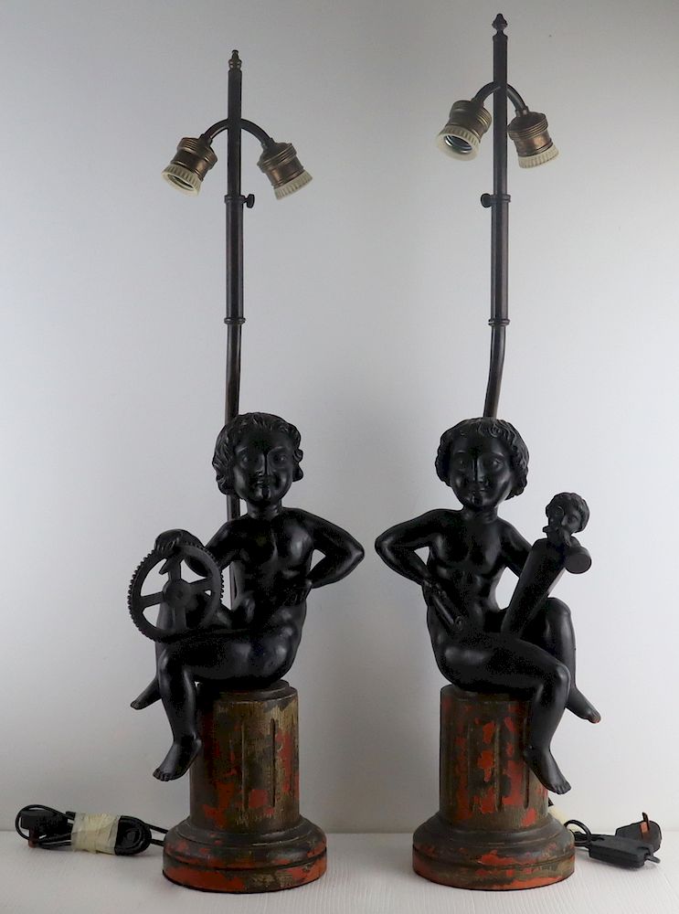 Appraisal: Pair of Italian Carved Puttis Mounted as Lamps Pair of