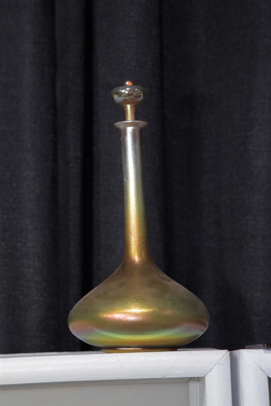 Appraisal: L C TIFFANY FAVRILE DECANTER Stoppered decanter in iridescent gold