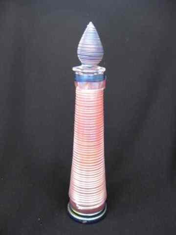 Appraisal: Czechoslovakia Art Glass Perfume Bottle lighthouse shape threaded iridescent ''