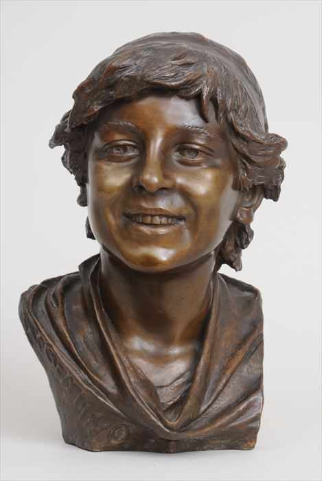 Appraisal: ARGENTINCO BUST OF A SMILING YOUTH Bronze facing forward with