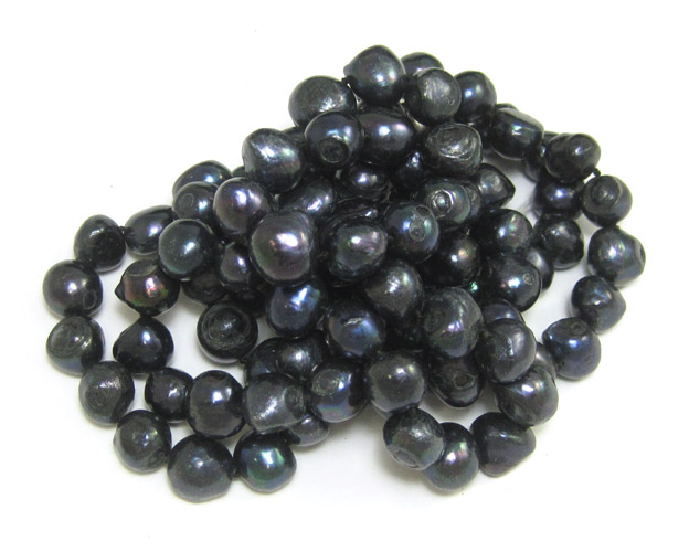 Appraisal: ROPE LENGTH BLACK PEARL NECKLACE inches in length strung with