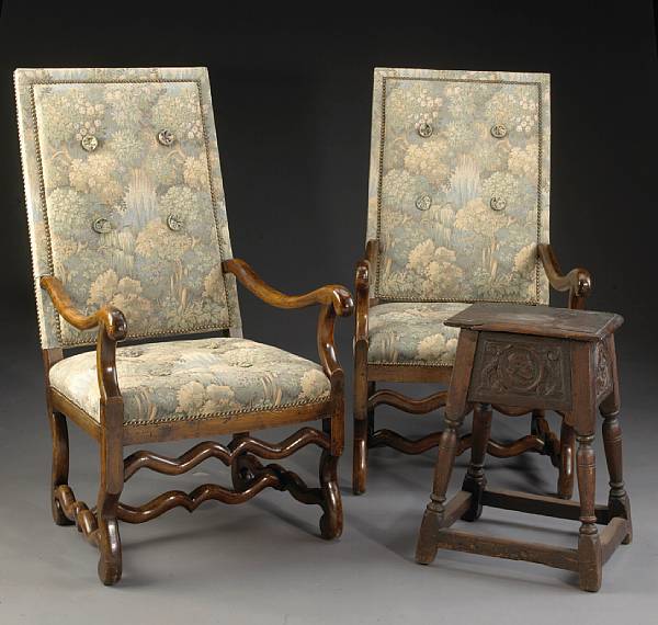 Appraisal: A pair of Italian Baroque walnut armchairs together with a