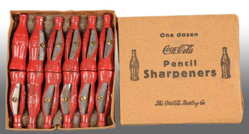 Appraisal: Set of Coca-Cola Bottle Pencil Sharpeners Description German s Unused