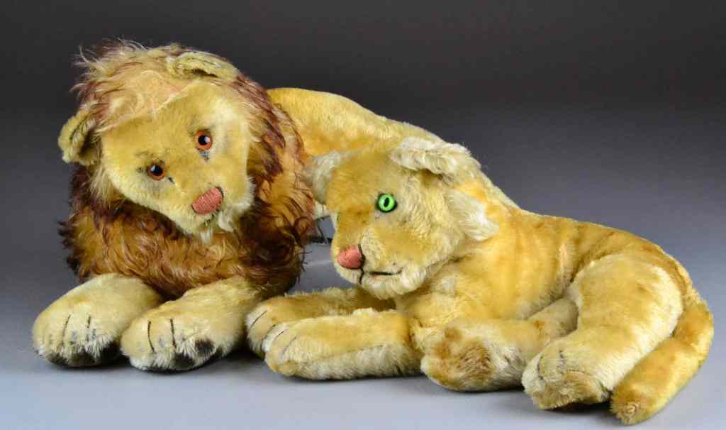 Appraisal: Pair of Steiff Lion Lioness Stuffed AnimalsReclining lion '' L