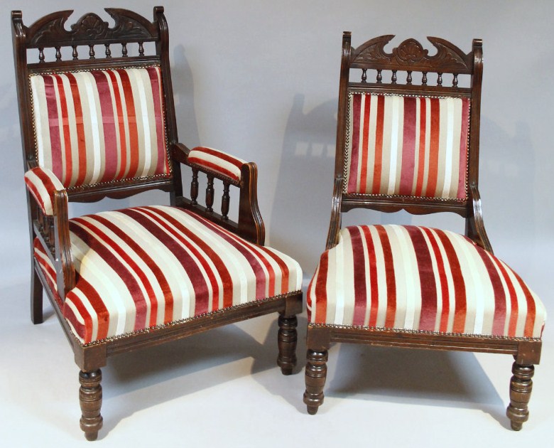 Appraisal: A pair of late Victorian walnut stained ladies and gentlemen's