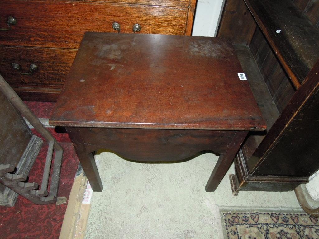 Appraisal: A Georgian mahogany commode of rectangular form with shaped apron