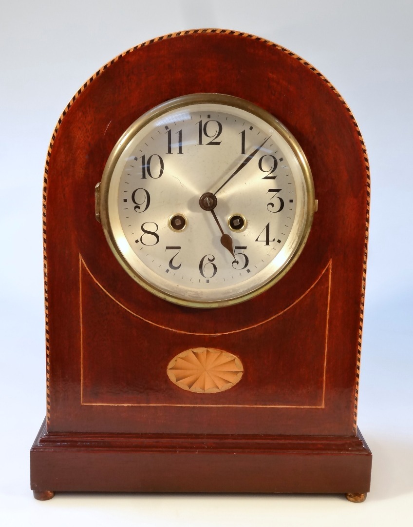 Appraisal: An Edwardian mahogany dome top mantel clock the cm dia