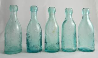 Appraisal: Soda aqua bottles Soda- aqua Pittsburgh and marked 'J C