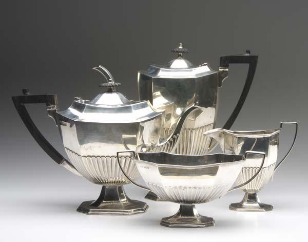 Appraisal: EDWARDIAN SILVER Coffee service Four pieces half reeded in the