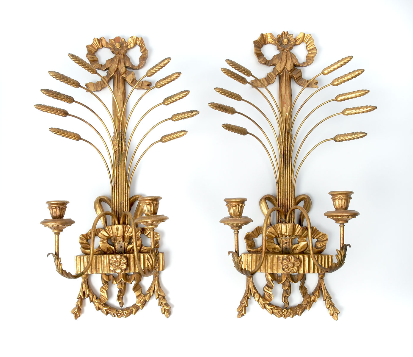 Appraisal: PAIR OF CARVED GILT ITALIAN WALL SCONCES Having a carved