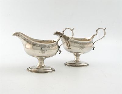 Appraisal: A pair of George III silver sauceboats by William Skeen