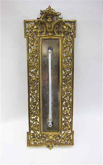 Appraisal: BRADLEY HUBBARD BRASS WALL THERMOMETER having pierced frame marked B