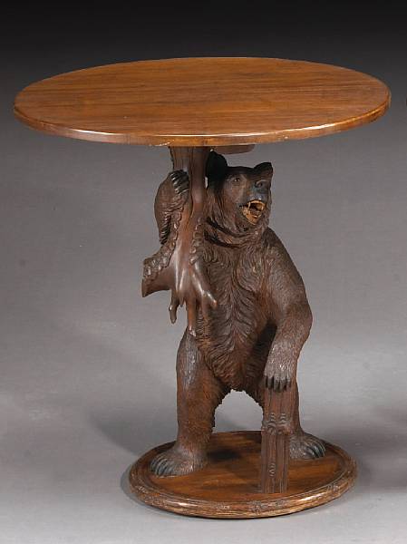 Appraisal: A Black Forest lindenwood table late th early th century