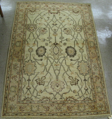 Appraisal: HAND KNOTTED ORIENTAL AREA RUG Pakistani Oushak overall floral design