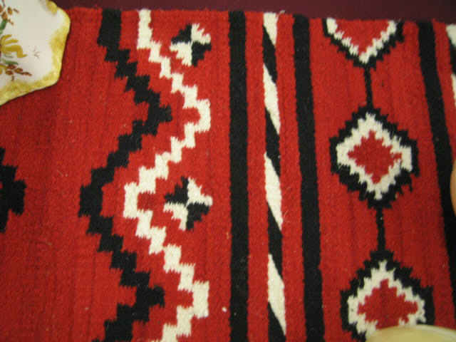 Appraisal: Indian Saddle Blanket an eye dazzling geometric on red