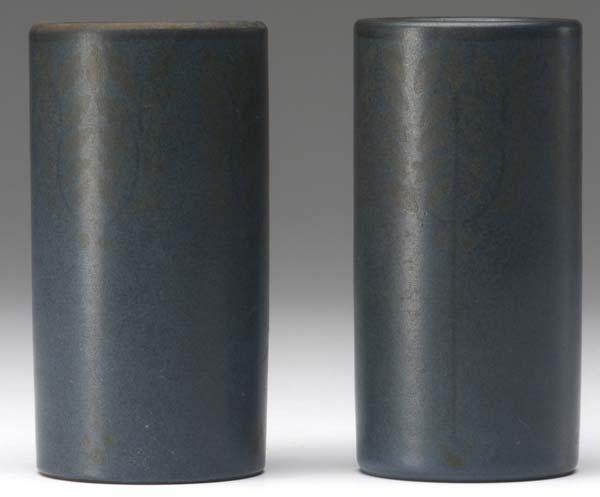 Appraisal: MARBLEHEAD Pair of cylindrical bud vases each decorated with a