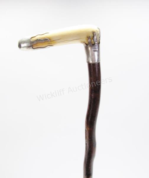 Appraisal: Sterling and Carved Handled Cane carved handle with sterling collar