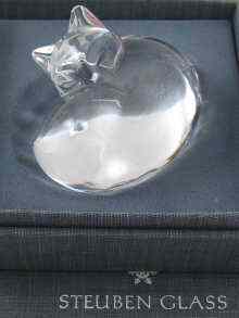 Appraisal: A glass paperweight designed as a sleeping cat by Steuben