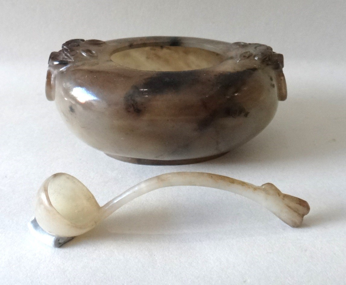 Appraisal: A Chinese agate oval bowl and spoon th th century