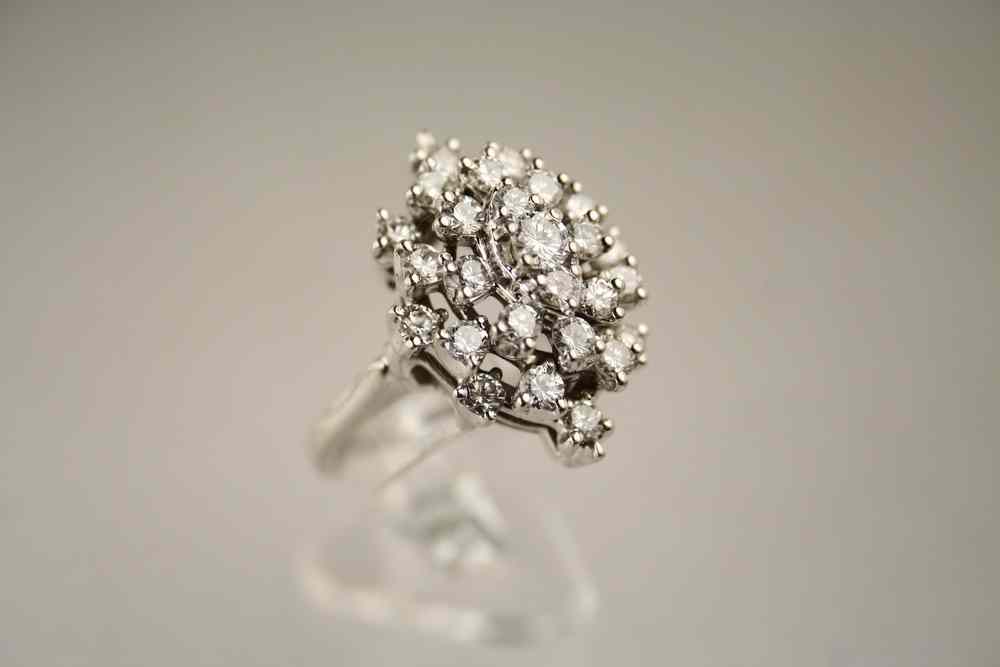 Appraisal: LADY'S RING - K white gold marquise shaped diamond cluster