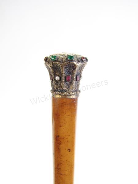 Appraisal: Bejeweled Cane A lovely vermeil knob walking stick with red