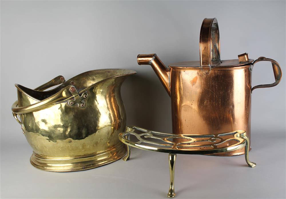 Appraisal: COPPER WATERING CAN A BRASS SCUTTLE AND TRIVET the tall