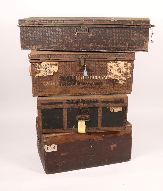 Appraisal: AN OFFICER'S FAUX LEATHER METAL FITTED TRAVELLING TRUNK containing a