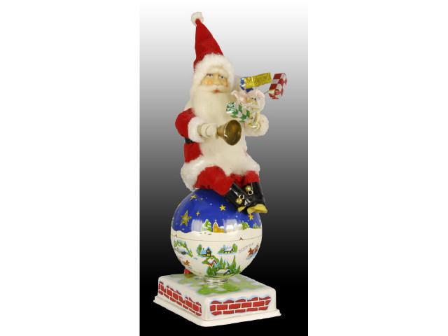 Appraisal: Battery-Operated Japanese Santa on Globe Toy Description With original box