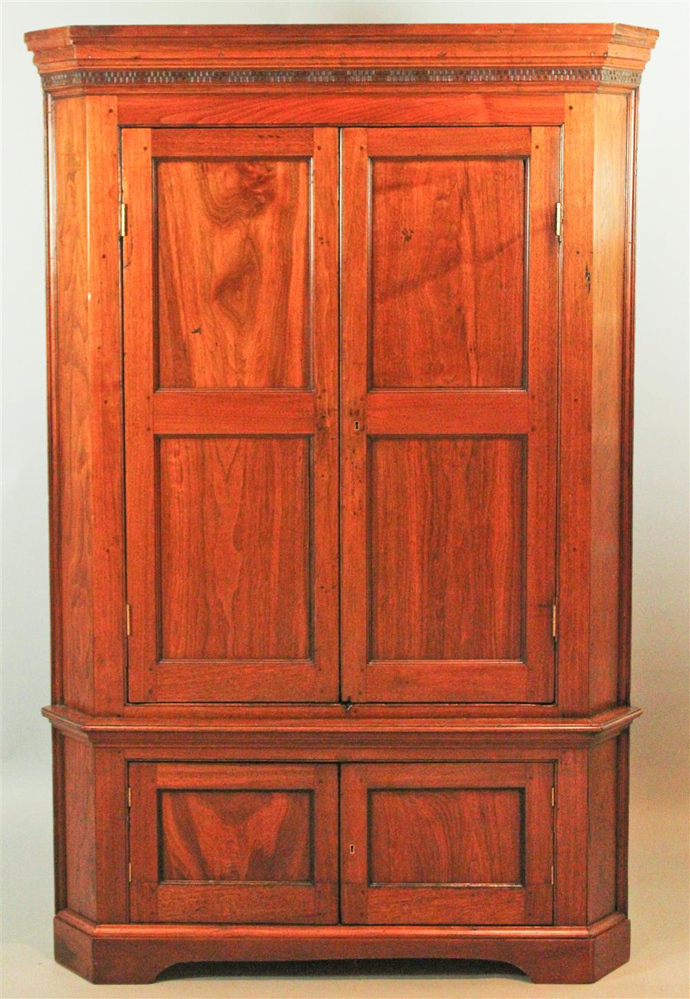 Appraisal: SOUTHERN CHIPPENDALE CHERRYWOOD CORNER CUPBOARD WITH GEOMETRIC PUNCHED FRETWORK POSSIBLY