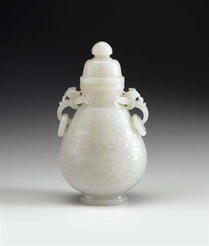 Appraisal: Large Chinese white jade twin-handle covered vase th century Of